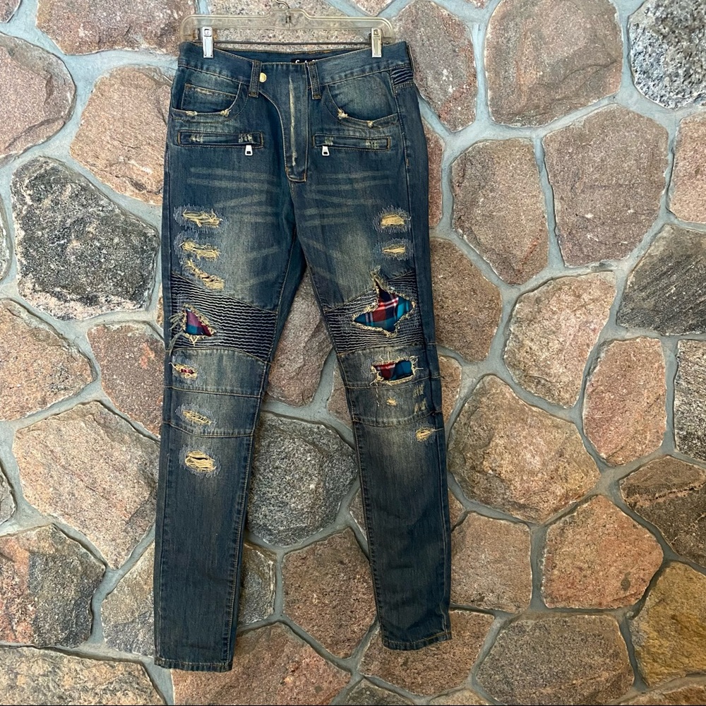 Embellish ripped jeans with plaid flannel inserts.